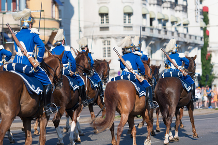 STOCKHOLM, SWEDEN - JUNE 6, 2019: Mounted royal guards behinde the Royal cortege during the national day of Sweden, June 6th.のeditorial素材
