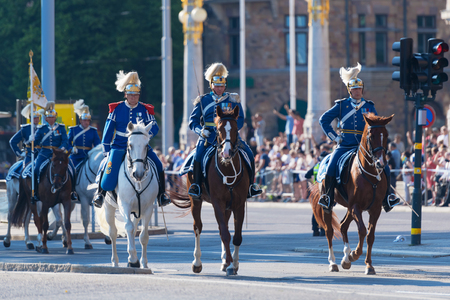 STOCKHOLM, SWEDEN - JUNE 6, 2019: Mounted guards before the Royal carriages during the national day of Sweden, June 6th.のeditorial素材