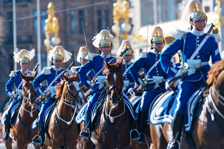 STOCKHOLM, SWEDEN - JUNE 6, 2019: Mounted guards before the Royal carriages during the national day of Sweden, June 6th.のeditorial素材