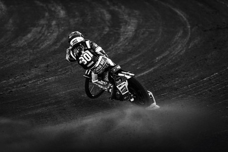 HALLSTAVIK, SWEDEN, JULY 6, 2019: Leon Madsen (DEN) in black and white at the Speedway GP in Hallstavik in the HZ Bygg Arena.のeditorial素材