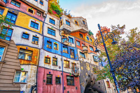 VIENNA, AUSTRIA, OCTOBER 23, 2019: Hundertwasser house, Hundertwasserhaus - apartment house, idea and concept of Austrian artist Friedensreich Hundertwasser. Colorful facade with growing trees, Autumnのeditorial素材