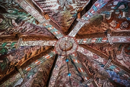 HAVERO, SWEDEN - JULY 30, 2019: Details of ornaments at the ceiling inside Havero church in the Roslagen County outside of Grisslehamn. The well onamented church is from the 1300.のeditorial素材