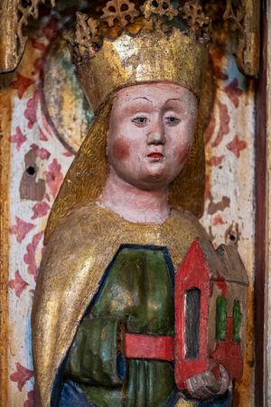 HAVERO, SWEDEN - JULY 30, 2019: Wooden statues inside the Havero church in the Roslagen County outside of Grisslehamn. The well onamented church is from the 1300.のeditorial素材