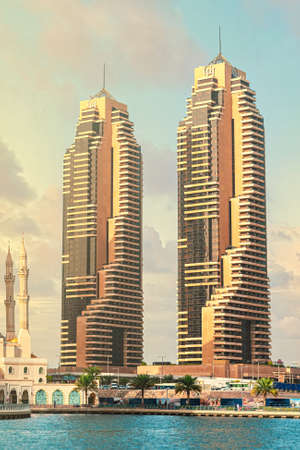 DUBAI, UAE - JAN 24, 2019: Hotel Grosvenor house at the Jumeirah Beach area, a Luxury Collection Hotel rising high above Dubai Marina. Walking housesのeditorial素材