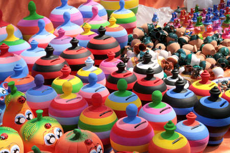 Stall of colored pottery at a village fairの写真素材