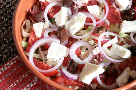 Close-up of greek salad in an earthenware bowlの写真素材