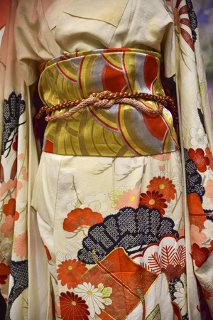 Kimono. Traditional Japanese dress for women with colorful decorationsの写真素材