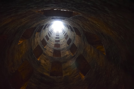 St. Patrick's well, Orvieto, Italy. Historic well. Great engineering work, built in 1547. depth 54 meters, width 13 meters .. characteristics are the spiral stairsのeditorial素材