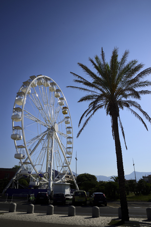 white ferris wheel at sunsetの写真素材