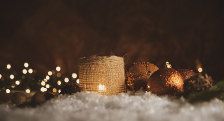 Christmas decorations. Candle with golden spheresの写真素材