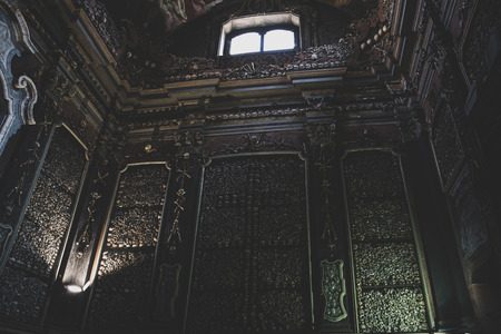cluster of skulls in the church ossuaryのeditorial素材
