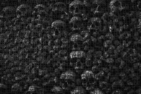 Milan, Italy, February 2019. Church of San Bernardino alle ossa. (San Bernardino to the bones). Cluster of skulls in the church ossuaryのeditorial素材