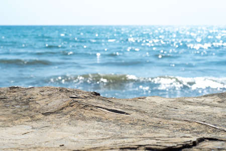 Empty cliff stone with summer blue sea blur background. Copy space for display of product on online mediaの写真素材