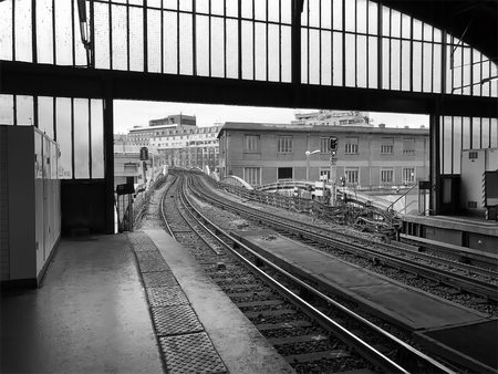 Train's entrance way into a metro rail station above ground.