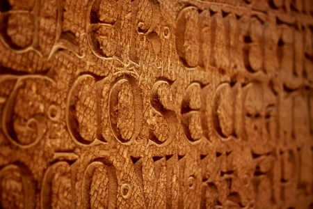 Engraving of an ancient text on a wall 