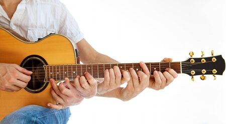 Guitar master instructor play his acoustic guitar with magical multiple handsの写真素材