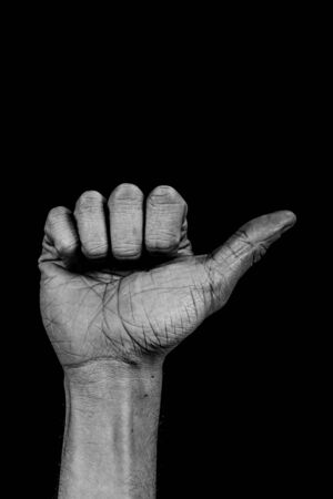 number one composed by a grunge hand isolated on black background