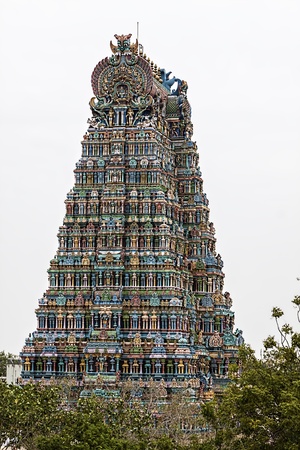 Indian temple in Madurai on a white sky as background の写真素材