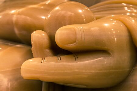 Detail of a sculpture of Buddha made with a precious stoneの写真素材