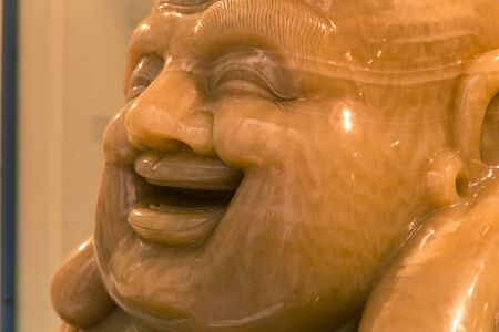 Detail of a sculpture of Buddha made with a precious stoneの写真素材