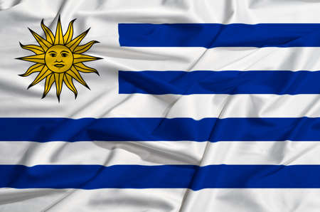 Uruguay flag on a silk drape wavingの写真素材