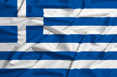 Greece flag on a silk drape wavingの写真素材