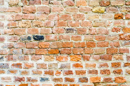 Brick wall on a old aged houseの写真素材