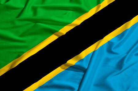 Tanzania flag on a silk drape wavingの写真素材