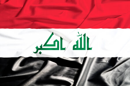 Iraq flag on a silk drape wavingの写真素材