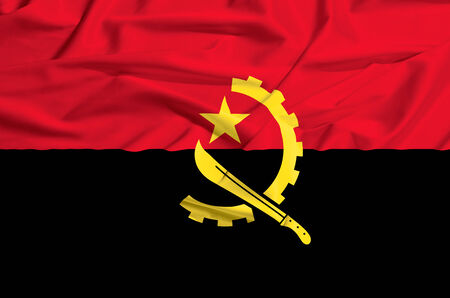 Angola flag on a silk drape wavingの写真素材