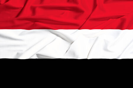 Yemen flag on a silk drape wavingの写真素材