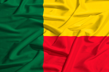 Benin flag waving on a silk drapeの写真素材