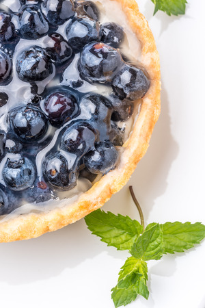 fresh blueberries tart on a wooden deskの写真素材