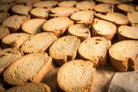 rack of bread baked biscuits in an industrial ovenの写真素材