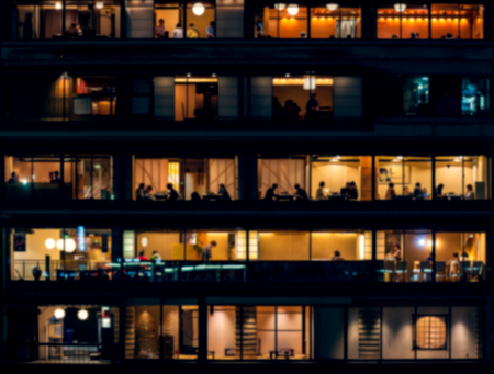 Blurred background of a city in night timeの写真素材