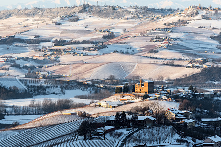 Grinzane Cavour castle and mountains in northern italy, langhe region, piedmont