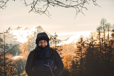 young woman makes winter trekking on the dolomitesの写真素材