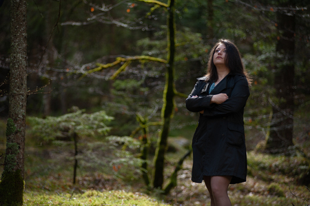 beautiful woman, chubby model in the woodの写真素材