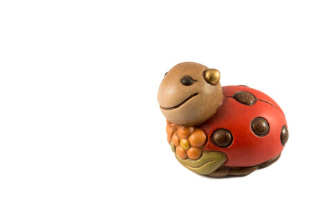 smiling Wood Ladybug on white backgroundの写真素材
