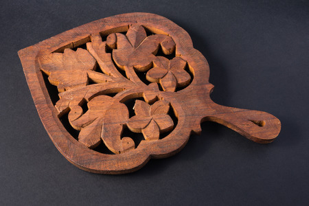 Handcraft wood trivet for save table from hot potsの写真素材