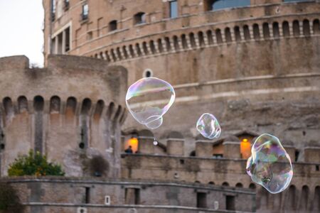 Colorful soap bubbles and the vatican in background (castel sant