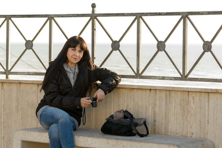 A portrait of a nice girl to the seaside in winterの写真素材