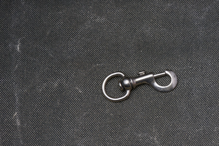 A Carabiner on a texile background