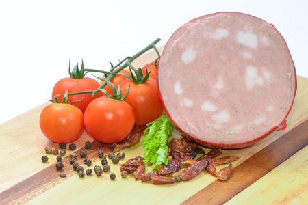 Italian Mortadella Bologna with tomatoes and vegetablesの写真素材