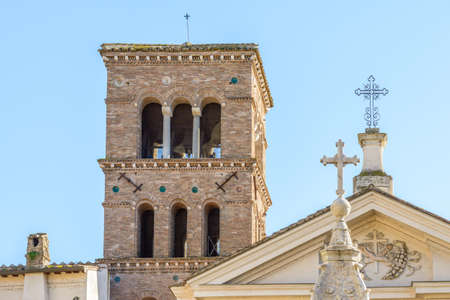 statue and church on the tiberina isle in rome italyの写真素材