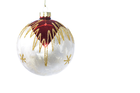 Crystal christmas ball with gold and red decorsの写真素材