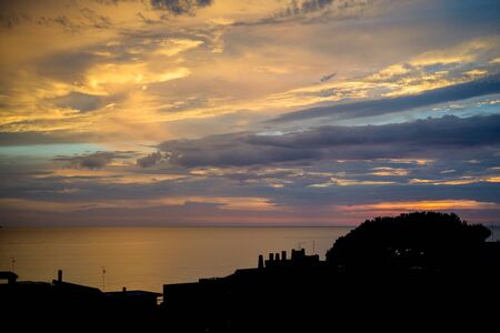 awesome sunset at seaside near Rome in Italyの写真素材