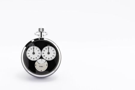 An old black and chrome chronometer perfectly working on a white backgroundの写真素材