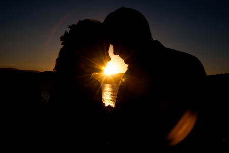 The bride and the husband on sunset in dominican republicの写真素材