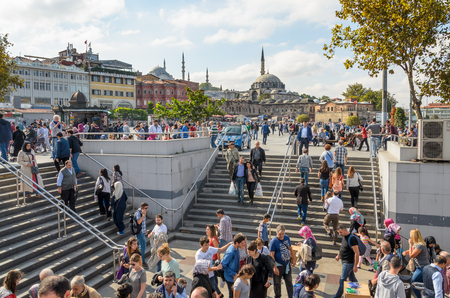 Istanbul, Turkey - October 03, 2015: people in the Eminonu square back of the Beyazit Mosqueのeditorial素材